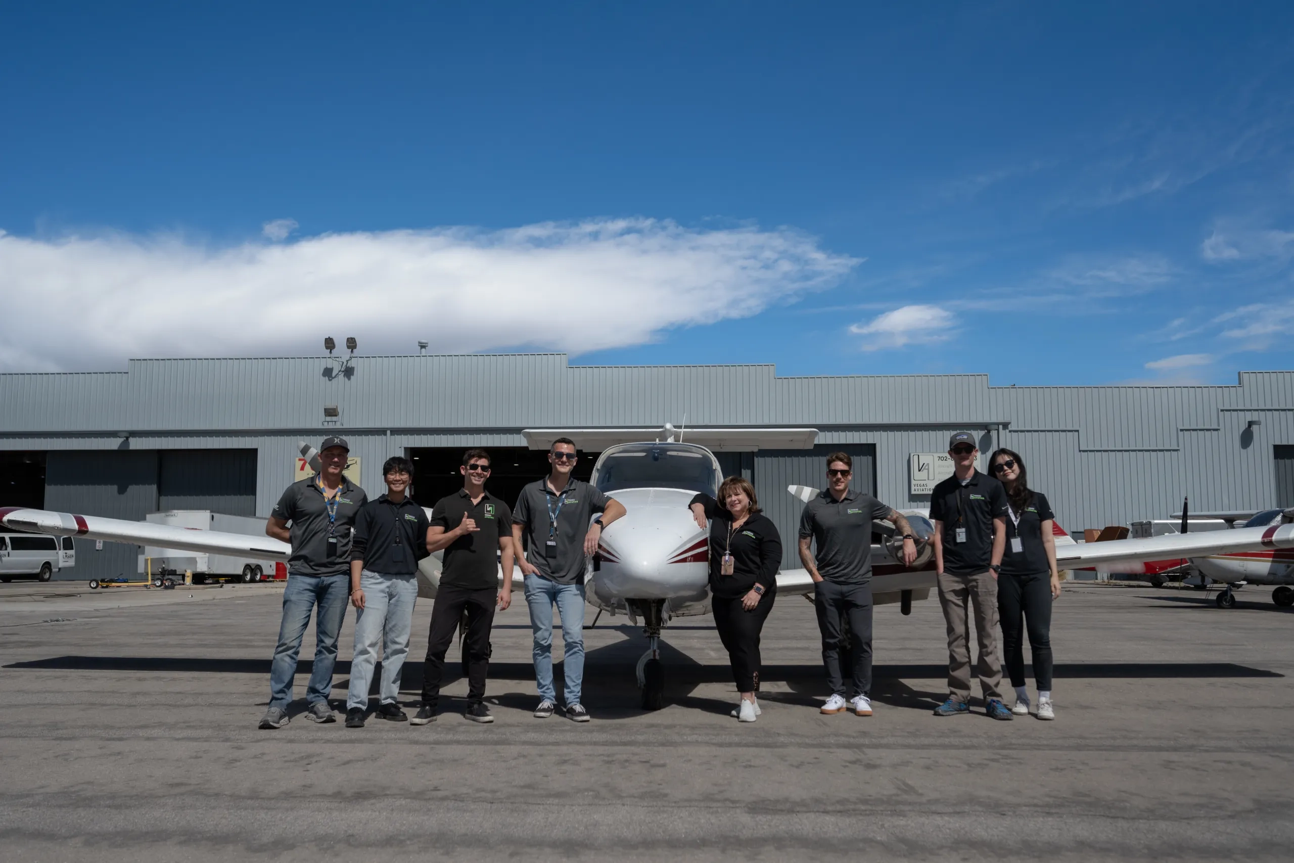 Vegas Aviation CFI team in front of an airplane