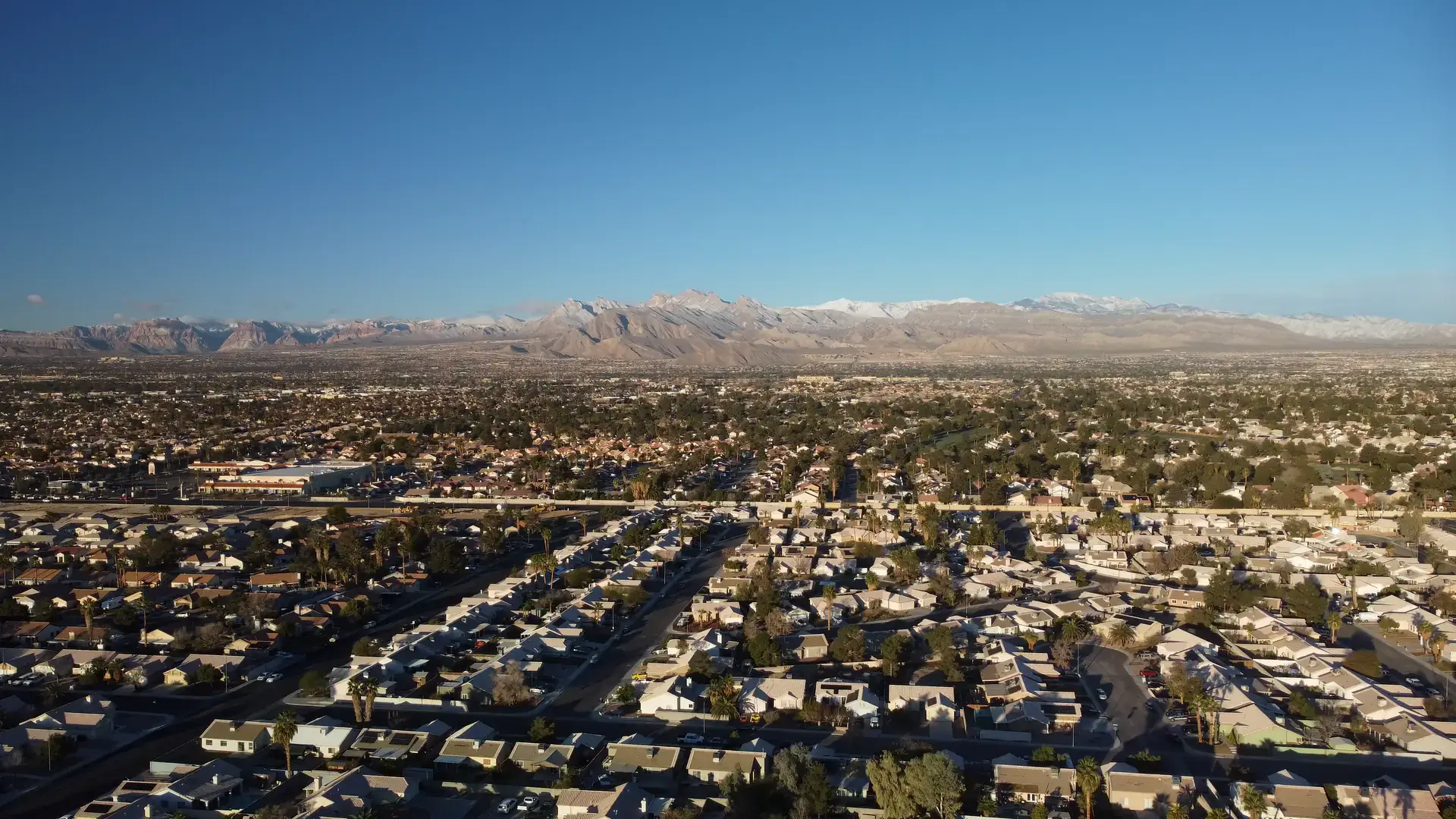 Las Vegas landscape seen from the air with mountain range in the background