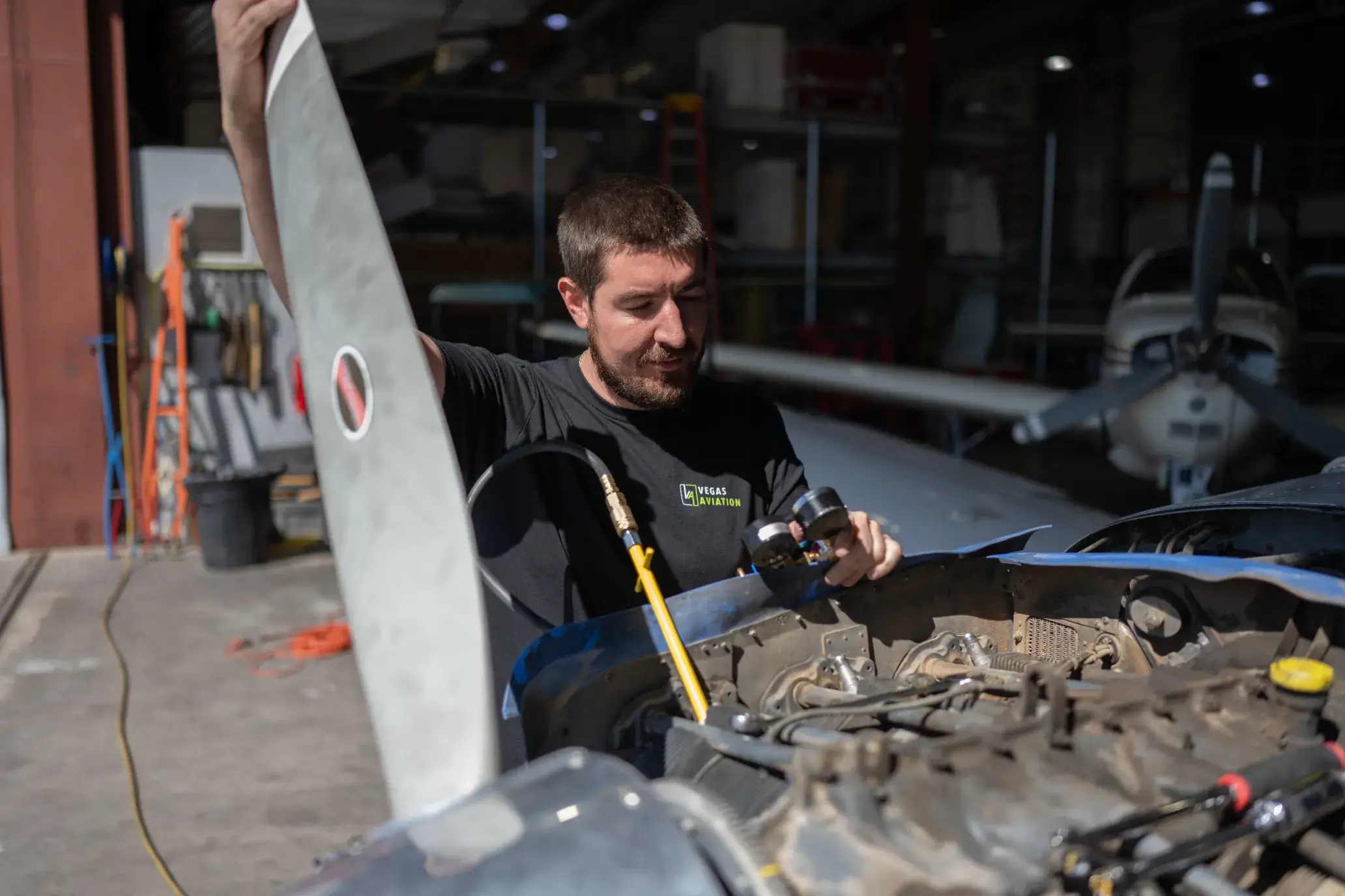 Mechanic looking over an aircraft's engine