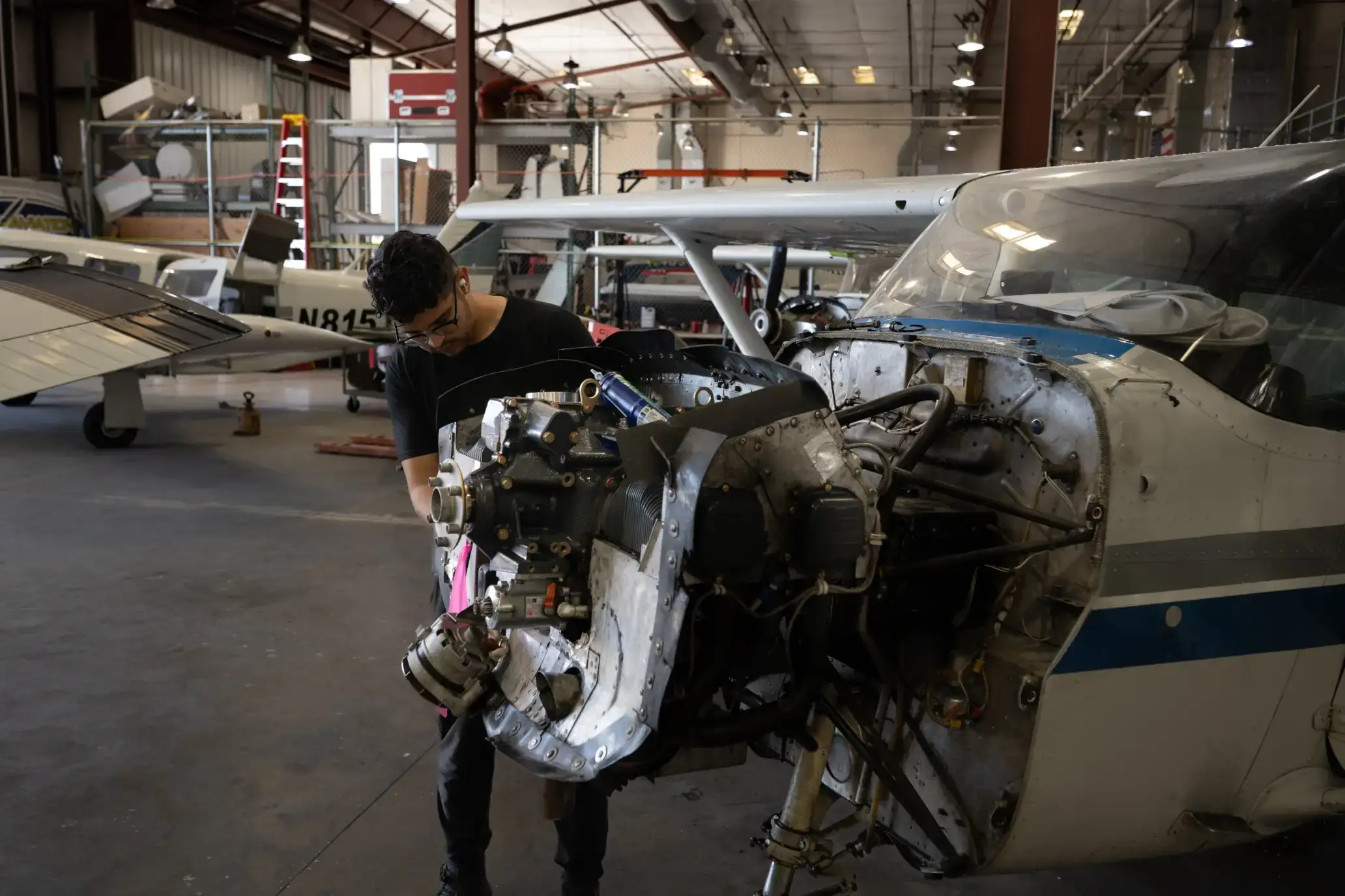 Mechanic working on an aircraft's engine